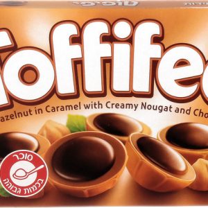 אריזת טופי־פי, ממתקים עגולים מצופים שוקולד, עם אגוז לוז בקרמל ונוגט.